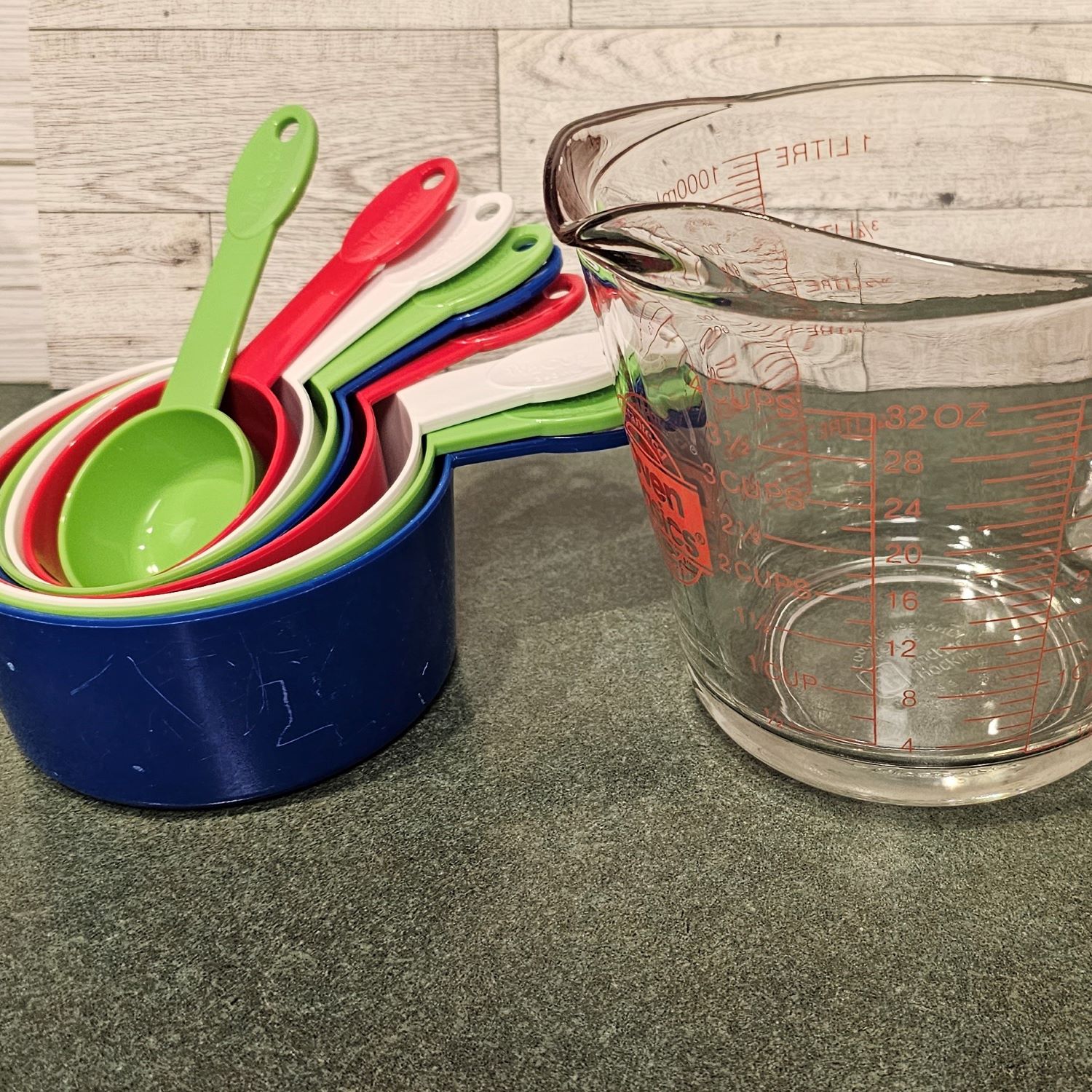 A liquid measuring cup and the metric system