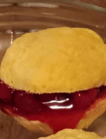 Biscuit with cherry pie filling.